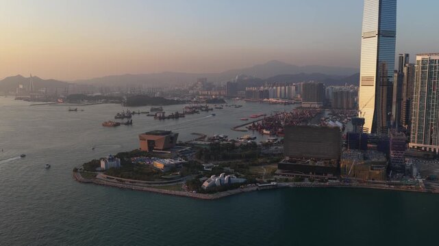 Aerial view of hong kong skyline and victoria harbour at sunset