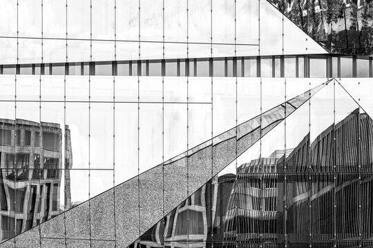 Modern architecture detail with abstract geometric lines on facade building windows in monochrome contrast for corporate office business design