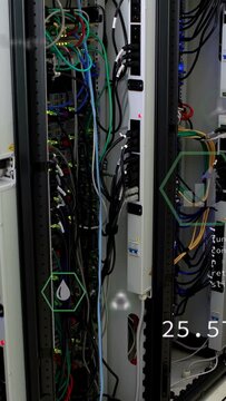 Vertical video: Rack staying in tech room, sequence starting and AR CO2 icons expanding, monitoring