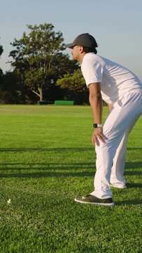 Vertical video: Fielder on right tracking cricket ball in flight, shifting and catching to end play