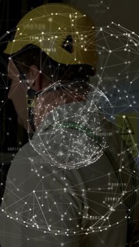 Animated network globe drifting and spinning, revealing helmeted worker turning head for beam check