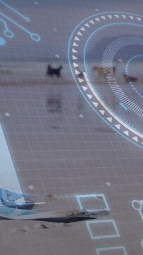 Vertical video: Drone arising on horizon gliding left across shore, HUD grid tracing motion for AR