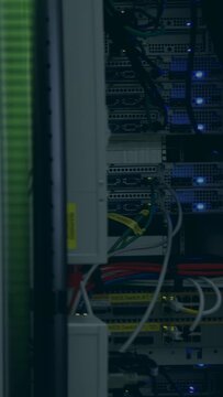 Vertical video: Overlay appearing, rising over rack, values updating, panning showing network load