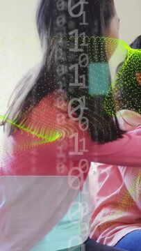 Vertical video: Big sis turning, reaching and comforting sis on sofa as tech overlay hiding faces