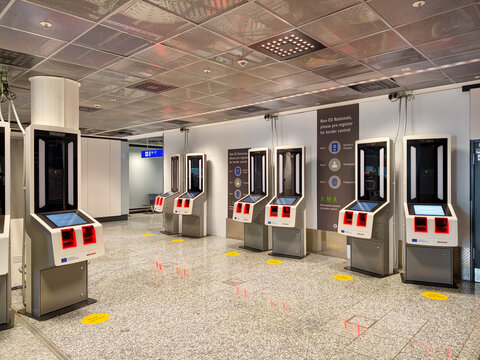 Automated passport control kiosks for biometric verification at Frankfurt Airport terminal