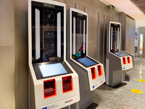 Automated passport control kiosks for biometric verification at Frankfurt Airport terminal