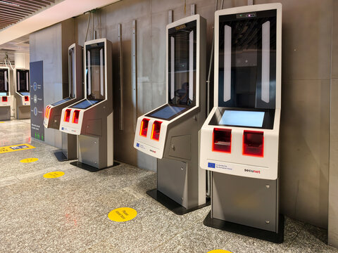 Automated passport control kiosks for biometric verification at Frankfurt Airport terminal