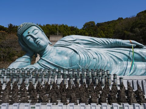 Reclining Buddha bronze statue Fukuoka landmark Nanzoin Temple Japan travel : Fukuoka, Japan - Mar 14 2026