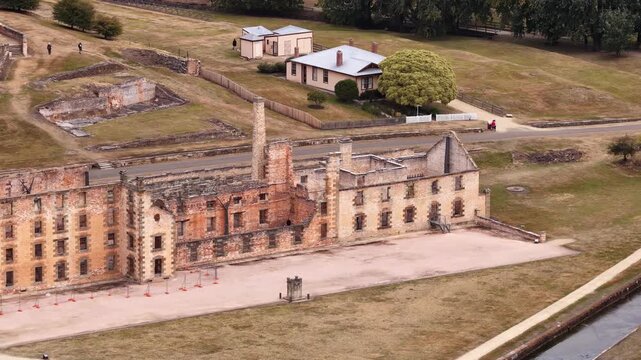 Main building facade of the Penitentiary sandstone construct in Port Arthur of Tasmania.