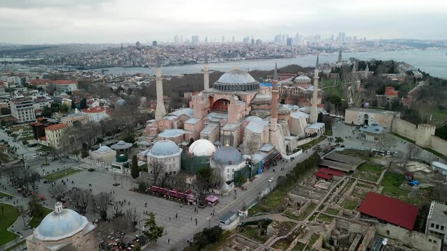 Istanbul Hagia Sophia mosque with Golden Horn in the background fly backward