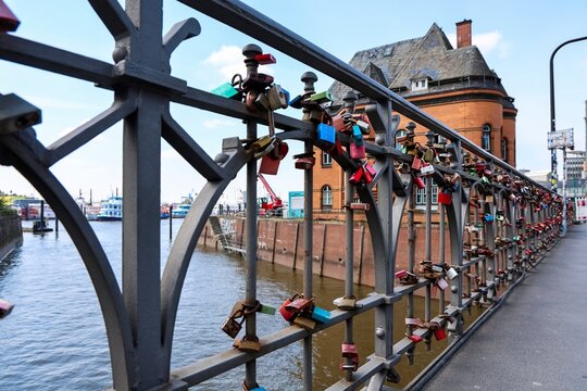 Hamburg, Germany - 15. April 2026: Love locks adorning bridge railing in Hamburg Germany