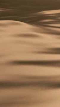 Smooth brown surface with gentle wavy motion video