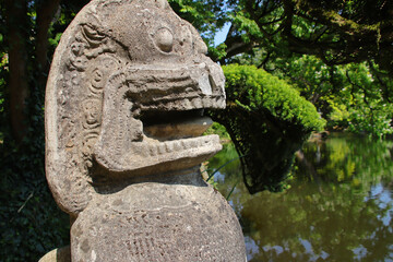 khmer style sculpted lion in a japanese and oriental park in maulévrier in france  © frdric