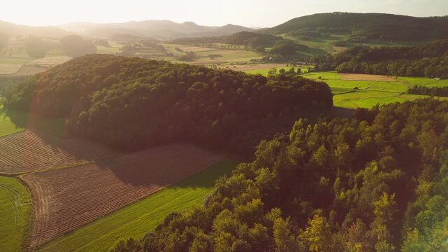 Aerial Drone View of Agricultural Fields in Mountainous Lower Silesia at Sunset, Golden Hour Landscape