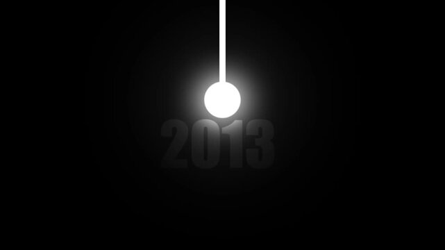 A bright white sphere with a radiant glow is suspended by a thin white line against a dark black background with the year 2013 subtly presented in gray text below the sphere suggesting a