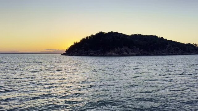 Vehicle and passenger ferry departing from Nelly Bay Harbour on Magnetic Island to Townsville, Queensland, Australia. Coastal transport, travel and maritime connection.