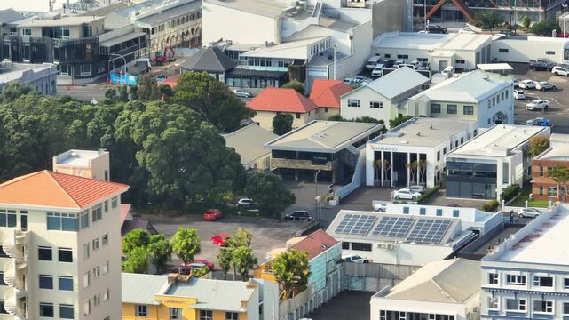 NEW PLYMOUTH, NEW ZEALAND, 7 April 2026 &ndash; An aerial view shows a construction site with heavy machinery and building materials, indicating ongoing development in the urban landscape.