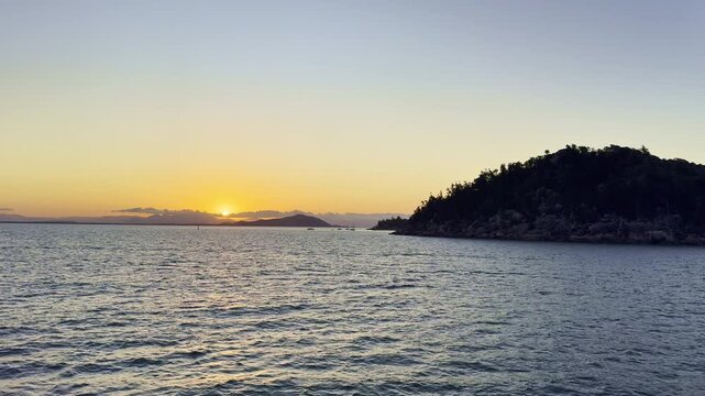 Vehicle and passenger ferry departing from Nelly Bay Harbour on Magnetic Island to Townsville, Queensland, Australia. Coastal transport, travel and maritime connection.