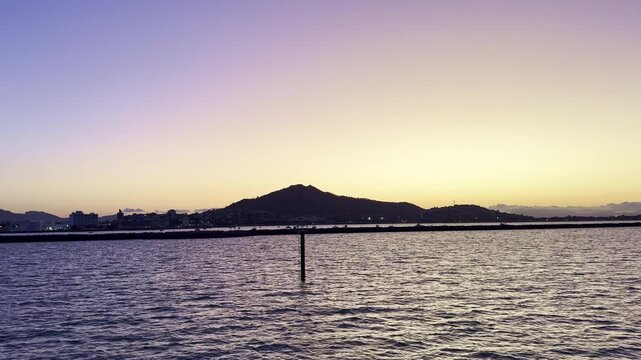 Vehicle and passenger ferry departing from Nelly Bay Harbour on Magnetic Island to Townsville, Queensland, Australia. Coastal transport, travel and maritime connection.