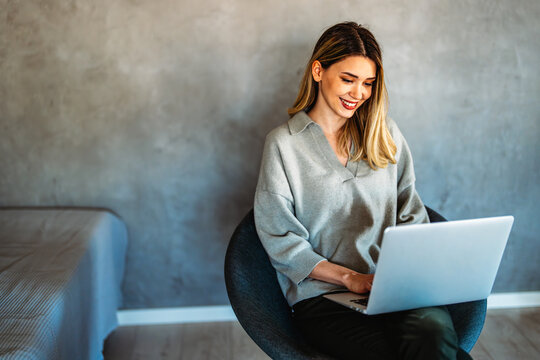 Success woman freelancer is working on a new project on laptop. Work business people concept.