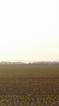Driving beside the countryside big farmland in spring