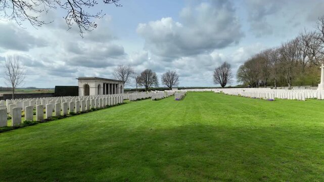 Vimy Canadian cemetery panning showing aligned headstone in a WW1 memorial landscape in Artois, Hauts de France. Full view. 60fps.