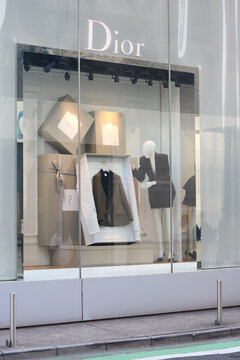 TOKYO, JAPAN - April 12, 2026: Display in the window of a Dior store in Omotesando.