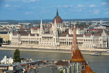 Obraz premium The Hungarian Parliament Building is in the late Gothic style and is a symbol of Hungary. It is situated on the Pest side of the Danube and is the seat of the Hungarian National Assembly.