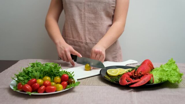 Healthy food preparation slicing yellow tomato vitamins nutrition diet fresh ingredients kitchen