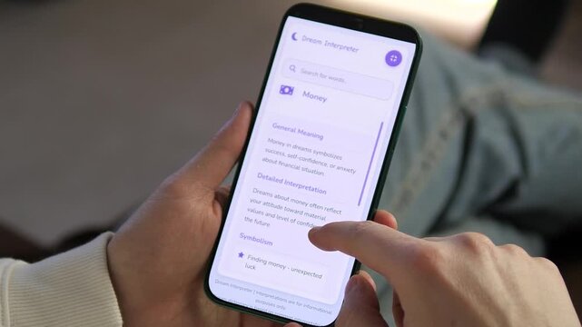 Person using Dream Interpreter app on smartphone to analyze symbols like money and water. Concept of subconscious exploration and digital spirituality. Ideal for psychology, lifestyle, and app review
