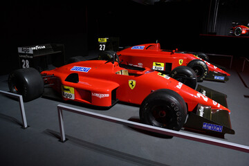 Fototapeta premium Scarperia; Italy - October 24th 2025: Ferrari F1-87 ex Michele Alboreto and Gerhard Berger on display during Ferrari World Finals 2025 at Mugello Circuit in Italy.