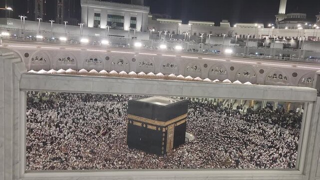 Mecca, Saudi Arabia - May 30, 2025 : Umrah pilgrims from different countries in the courtyard of the Grand Mosque, Mecca, during the month of&nbsp;Ramadan&nbsp;1446&nbsp;H.