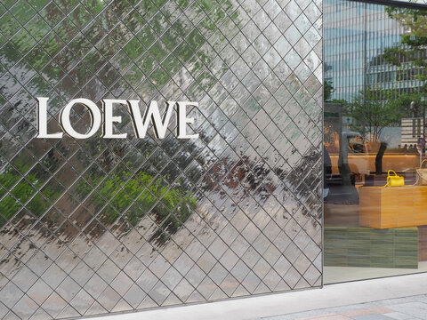 TOKYO, JAPAN - April 14, 2026: Sign on the front of a Loewe shop in Omotesando.
