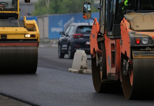 aying asphalt on the highway