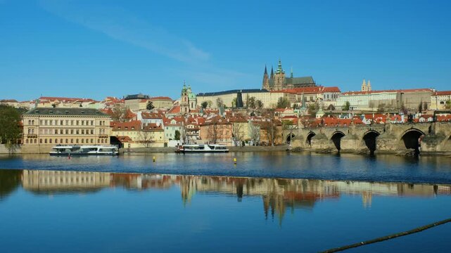 Explore the beautiful skyline of Prague with its historic architecture mirrored in the calm waters. This picturesque location promises a delightful experience for all travelers.