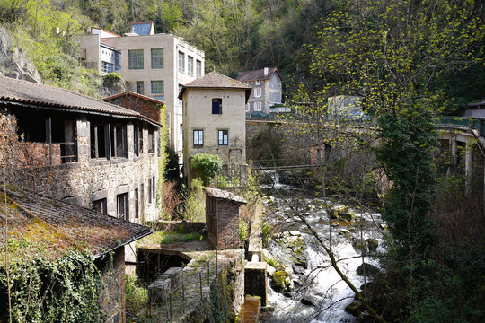 Historic cutlery factory ruins by Durolle river in Thiers, Auvergne, France