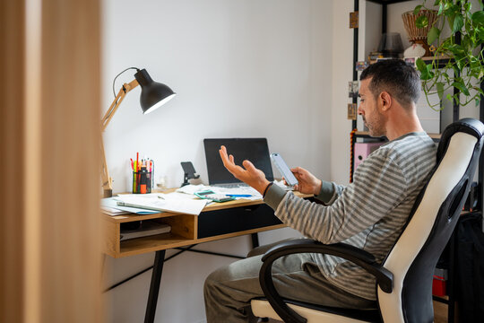 Entrepreneur analyzing finance report and suffering economic crisis