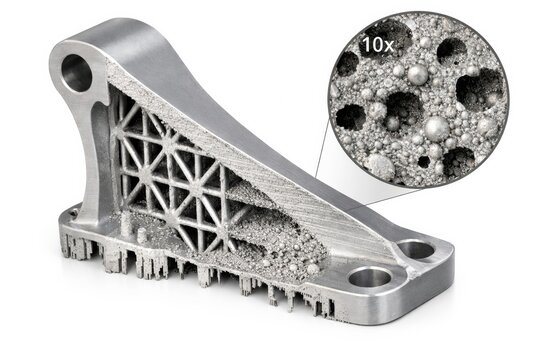 Close-up view of a 3D printed aerospace bracket with internal lattice structure
