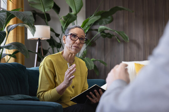Therapist speaking in a counselling session 