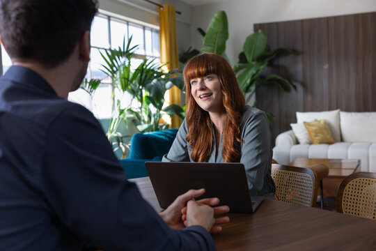 Businesswoman speaking in a meeting in a modern workplace