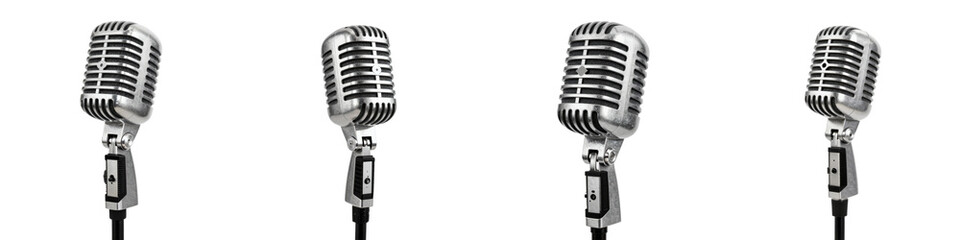 Fototapeta premium Four retro style microphones in a row against black backdrop for karaoke or concert