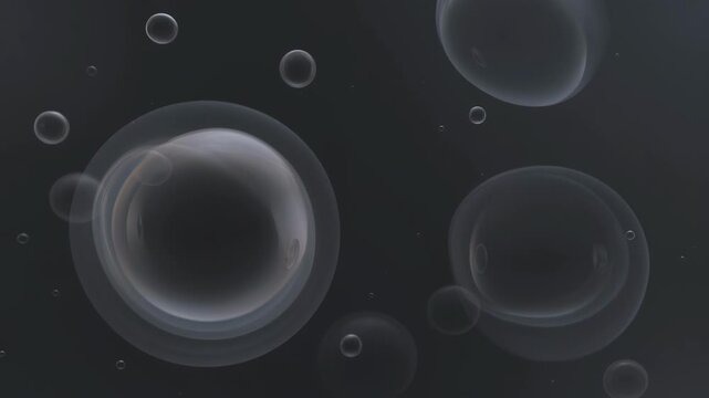 Abstract close-up of water bubbles and spheres on a dark background, creating a mesmerizing and ethereal effect.