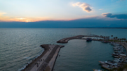 Naklejka premium Panoramic Sunset View of the Ancient Harbor and Marina in Side, Antalya, Turkey