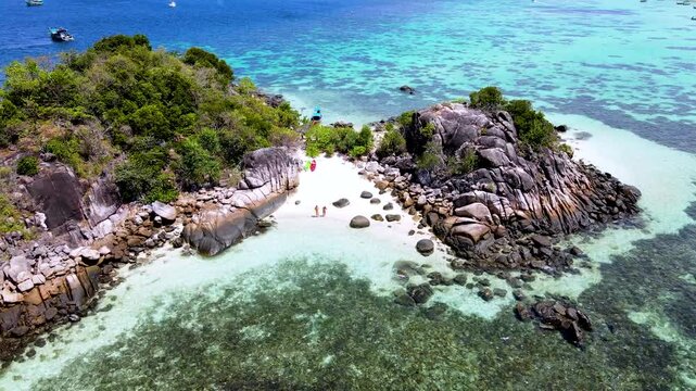 Discover the stunning beauty of Koh Lipe, Thailand with its enchanting beaches and vibrant marine life. Enjoy relaxing moments by the turquoise waters under the sun's warm glow.