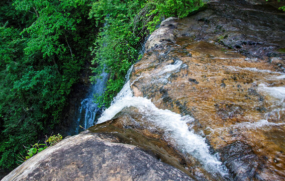 Standing above the waterfall