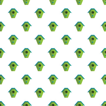 Repetitive green birdhouses creating a seamless pattern on a clean white background