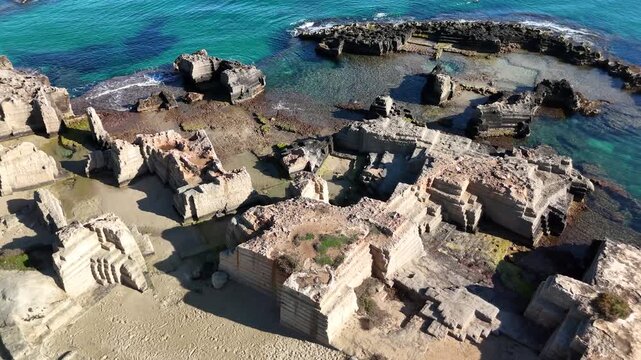 Aerial View of Rocky Coastline and Turquoise Cove in Monopoli, Puglia, Southern Italy
