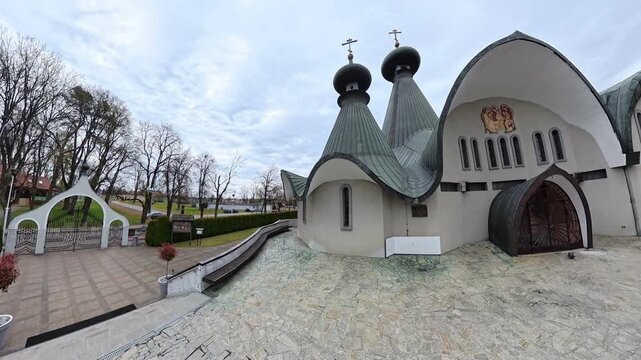 Holy Trinity Orthodox Cathedral with distinctive green copper domes and bell tower, Hajnowka, Poland