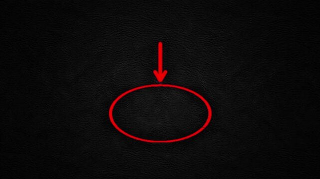 Red arrow pointing downwards into a vibrant red oval, creating a strong visual focus on a dark background, highlighting a key area with clear directional guidance and emphasis
