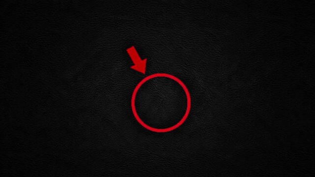 Prominent Red Arrow and Circular Highlight Against a Deep Black Textured Surface, Symbolizing Attention, Error, or Important Notification